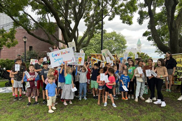 Parents and children rally at Robert F. Wagner Jr. Park in Lower Manhattan on Wednesday as officials prepare to break ground there on a new coastal resiliency project.